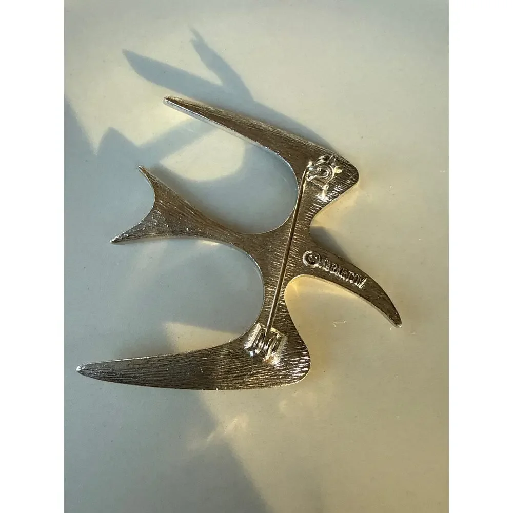 Sarah Coventry Trifari Bird in flight silver brooch